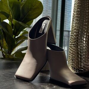 Alaia Elegant Taupe Mules